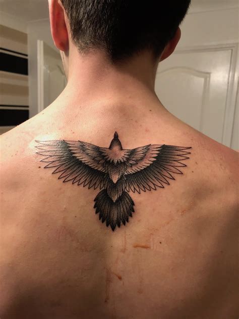 First Tattoo At Age 18 Flying Hawkeagle On Upper Back By Ellie White