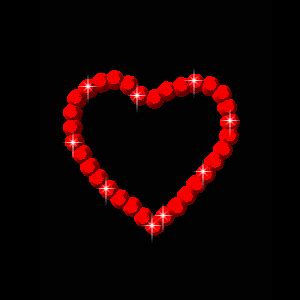 A Heart Made Out Of Red Beads With Sparkles In The Middle On A Black Background