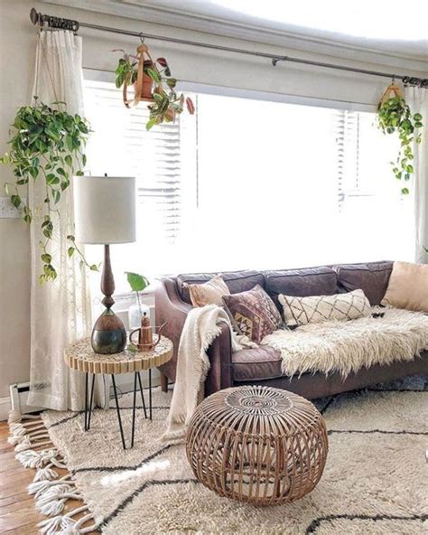 A Living Room Filled With Furniture And Lots Of Plants On The Windows Sills