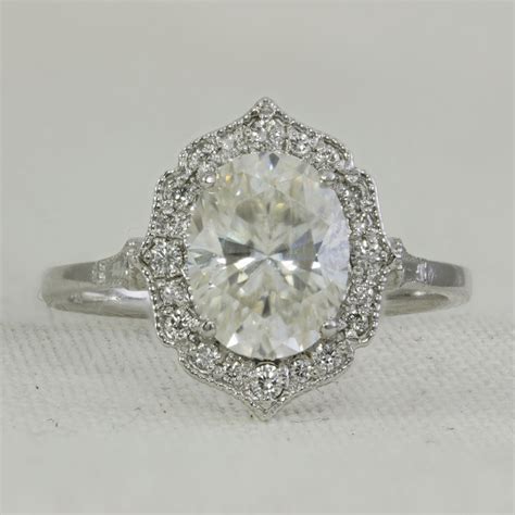 Art deco flowers 3/4 carat filigree vintage engagement ring setting design in 14k or 18k white gold for a 6mm round stone. Moissanite & Diamond Antique Style Ring - Engagement Ring Specialists
