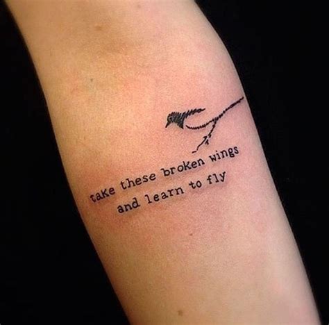 broken bird wings tattoo