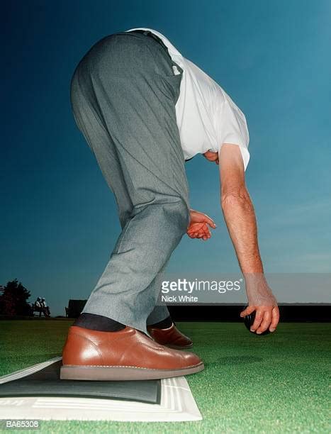 Man Bending Over From Behind Fotografías E Imágenes De Stock Getty Images