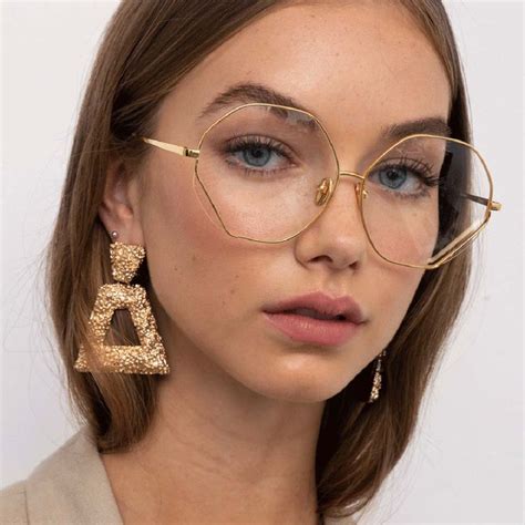 woman wearing oversized gold wire rim eyeglasses best eyeglasses online eyeglasses eyeglasses