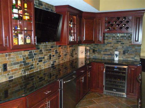 Kitchen remodeling pictures of kraftmaid cabinets with tumbled marble back splash. Cherry Cabinets, Granite Countertops, Natural Slate ...