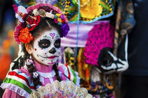 A Young Girl Dressed As La Calavera Catrina During The Day Of The Dead