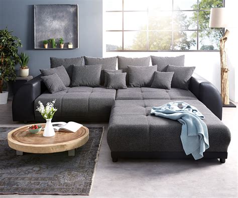 Wunderschönes mega sofa moldau in modernem lederlook schwarz und strukturstoff grau inklusive steppung in der sitzfläche. Bigsofa Violetta Schwarz 310x135 cm inklusive Hocker und ...