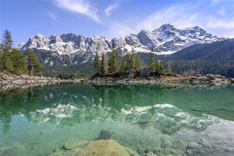 Reflections Of Zugspitze Mountain In Turquoise Eibsee Lake Garmisch