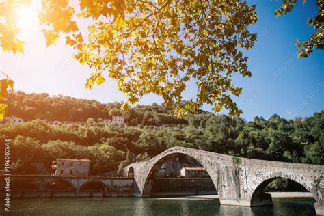 Picturesque View Of Devils Bridge Ponte Della Maddalena Across River