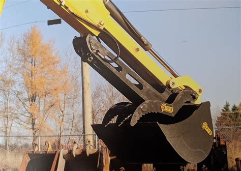 Backhoe Thumbs Mechanical And Hydraulic Extendahoes And Standard