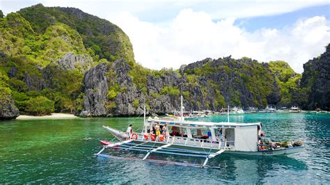 The Must Do Island Hopping Boat Tour From El Nido To Coron Philippines