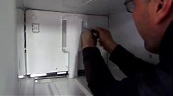 Repairing a broken refrigerator by replacing a freezer fan