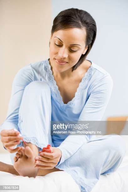 Black Woman Painting Her Nails Photos And Premium High Res Pictures