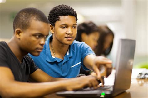 African College Students Using Laptop Together College Bound Mentor