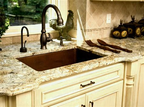 Dark brown cabinets bring out the white of the countertops and create a very put together look for the kitchen. Full Size Of Kitchen Cream With Grey Walls Ivory Cabinets ...