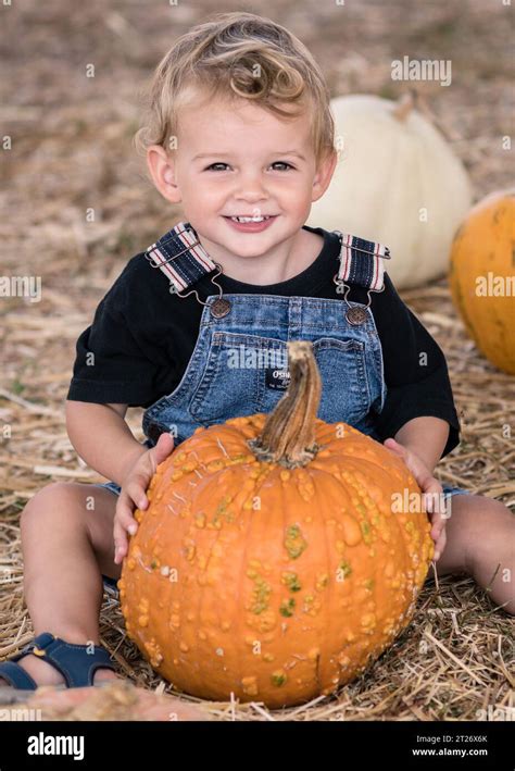 Caucasian Boy In Orange Shirt Hi Res Stock Photography And Images Alamy