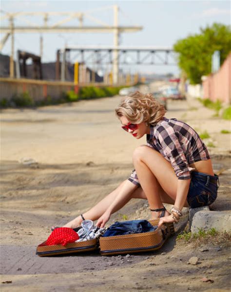 Royalty Free Suitcase Hitchhiking High Heels Sitting Pictures Images