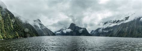 Cloudy And Rainy Day At Milford Sound South Island New Zealand Stock