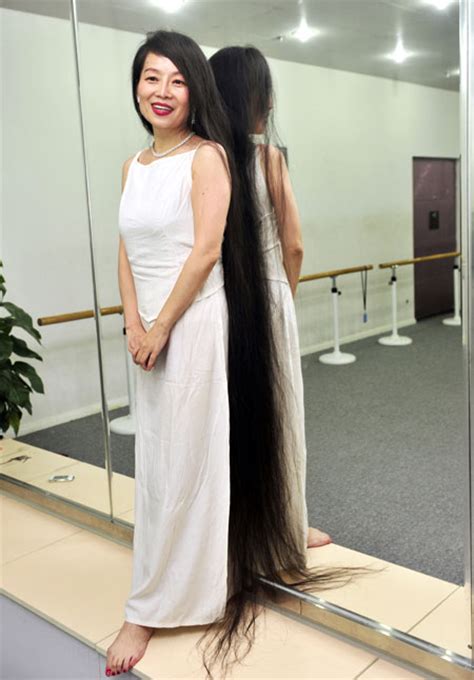 Woman Keeps 17 Meter Long Hair Cn