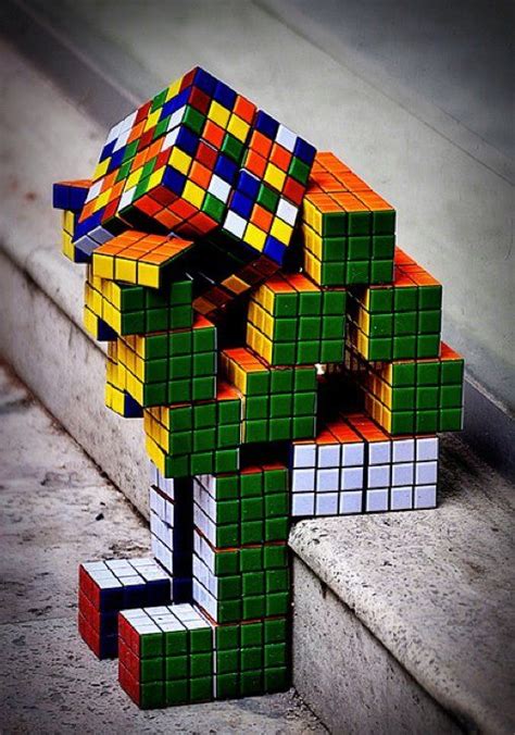 Lots of puzzle & solution games to choose from. Rubik's cube man sitting down | Lego rubiks cube, Rubix ...