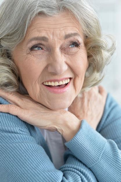 premium photo portrait of beautiful old woman at home