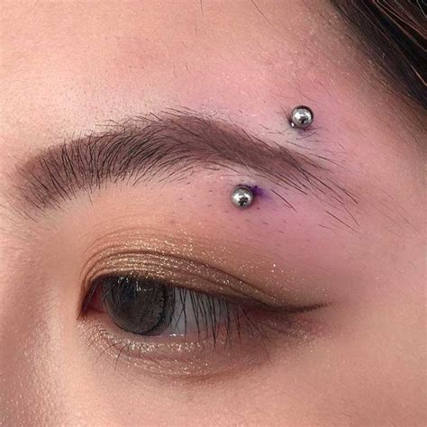 The Complete Guide To Eyebrow Piercing Blufashion