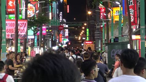 Tokyo Japan July 21 Crowds Of People Walk Along The Busy Neon