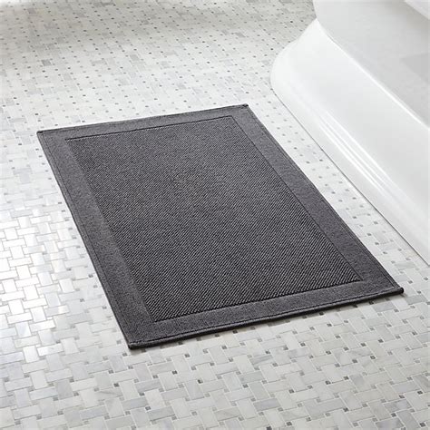 Add a charming striped rug to bring out the tones in your bath vanity accessories. Westport Grey Bath Rug | Crate and Barrel