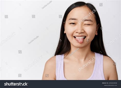 Beauty Positive Happy Asian Girl Winking Stock Photo 2050050938