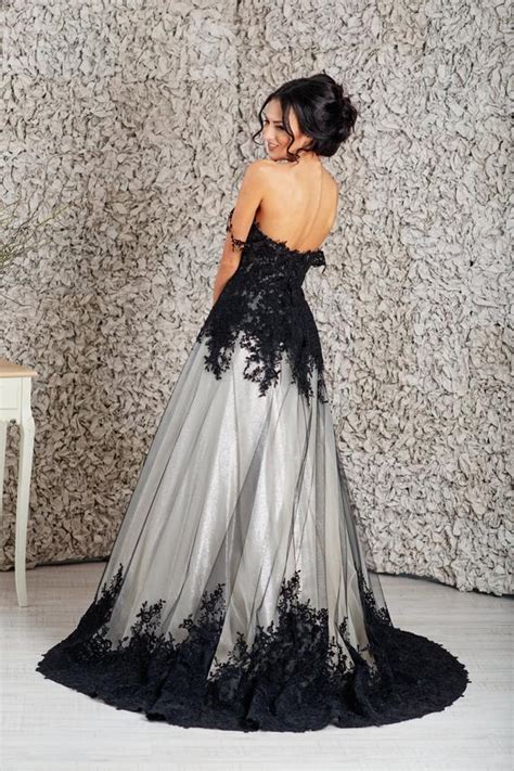 You aren't limited to looking like morticia adams! Black wedding dress Goth wedding dress Alternative wedding ...