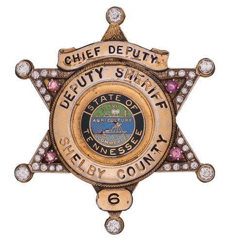 Elvis Presley's Gem Studded Shelby County Sheriff's Badge | Rock Island