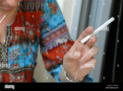 Woman Hand With Cigarette Stock Photo Alamy