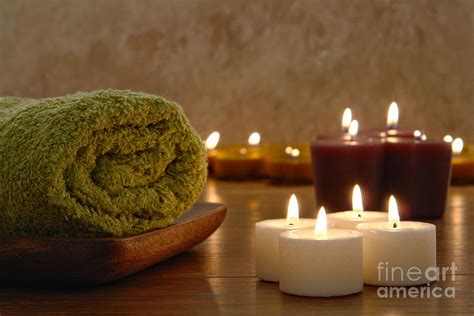 Towel And Aromatherapy Candles In A Dark Spa Photograph By Olivier Le