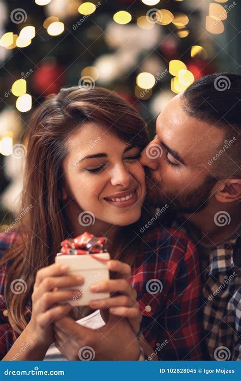 Woman And Man In Love Kisses On Christmas Eve Stock Image Image Of