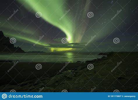Aurora Borealis Northern Lights Above Stokksnes Beach And Vestrahorn