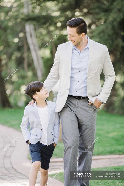 Father And Son Walking Along Path In Garden — Childhood Country