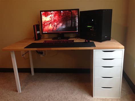 I love this desk! Ikea. The table top is called Gerton, the legs are called Godvin, and the 