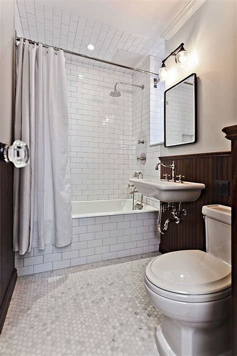 Explore tile finish and glazing. White subway tile and hex tile contrast in this bathroom ...