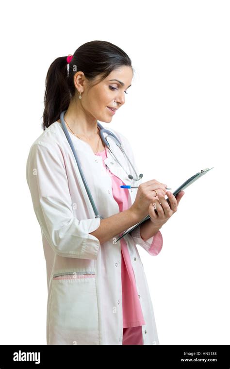 Portrait Of Doctor Woman Writing With Clipboard Isolated Over White