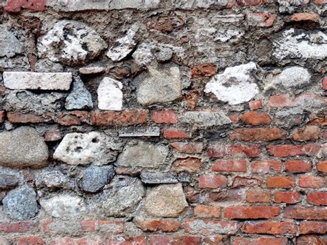 Unusual Masonry Of Red Bricks Ancient Stone Texture Stock Photo