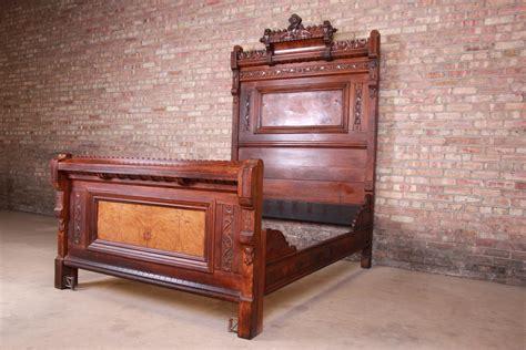 Monumental Eastlake Victorian Carved Walnut And Burl Wood Bed Circa