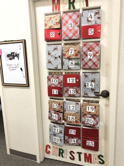 A Door Decorated With Christmas Cards And Numbers