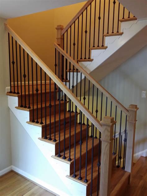 Wood railing, the source for mountain laurel handrail. Stair railings with black wrought iron balusters and oak ...