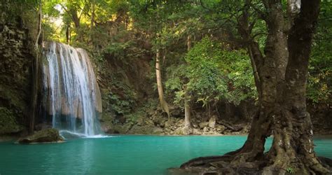 Paradise Jungle Forest With Beautiful Waterfall In Green Lush Of Erawan