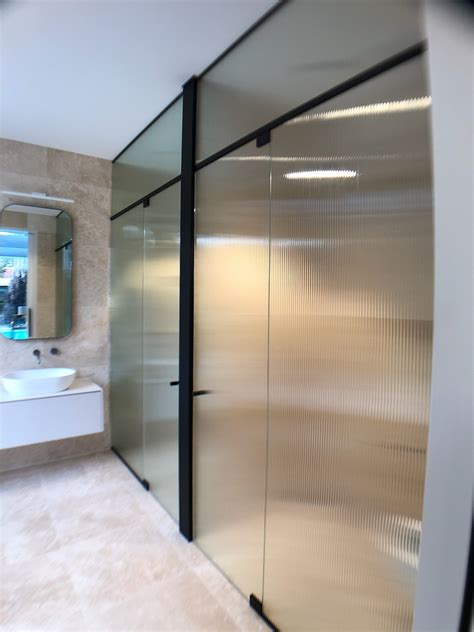 Architectural Reeded Glass Frameless Shower Screen Jim S Glass Glaziers Glass Repairs And