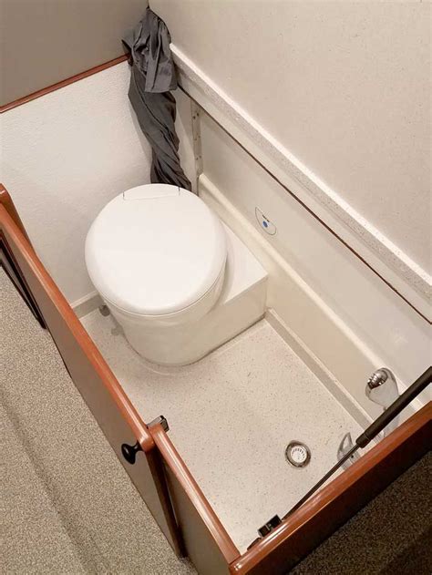 Interior View Of Toilet Compartment Next To Cabinets In A Sportsmobile