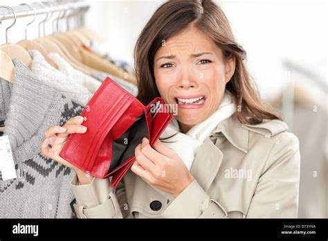 Empty Wallet Woman With No Money In Purse Shopping Female Shopper In Clothes Store Upset