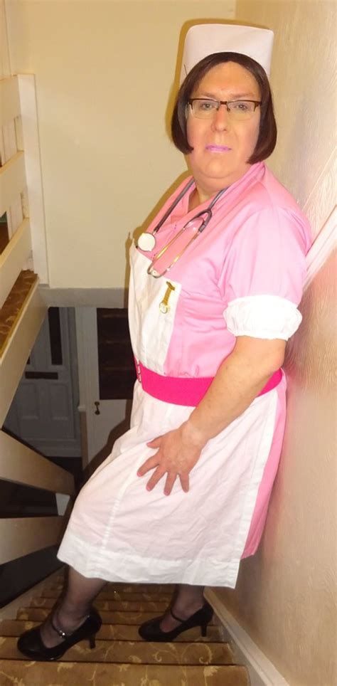 pink nurses dress with black stockings and mary jane shoes… flickr