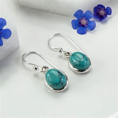 Sterling Silver Dangly Turquoise Oval Earrings By Martha Jackson