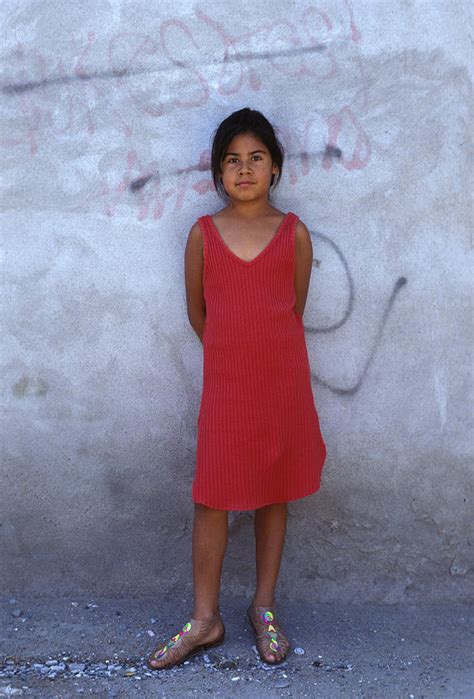 mexican girl in red dress photograph by mark goebel fine art america