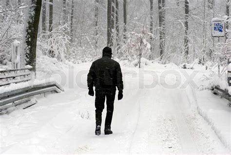 Man Walking In Snow Stock Image Colourbox